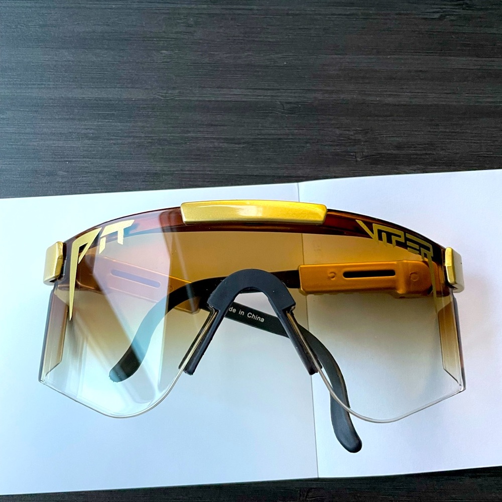 Pit Viper sunglasses. Black and gold. Extra pets too.